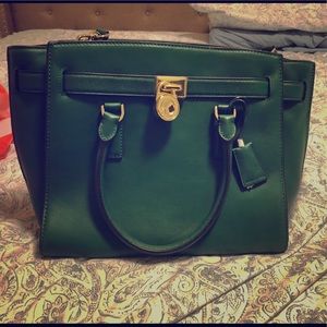 Michael Kors “Hamilton Traveller Bag”